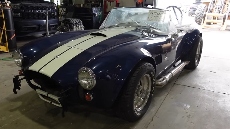 A Shelby Cobra kit car with flood damage