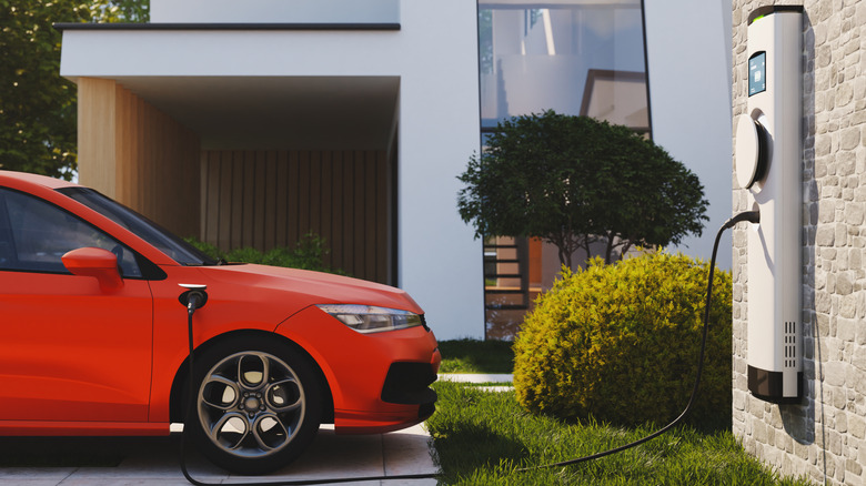 Electric vehicle using a charger installed at home