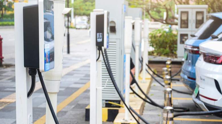 two EV's at a charging station