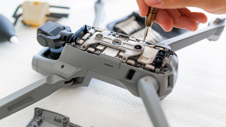 Disassembled drone on tabletop