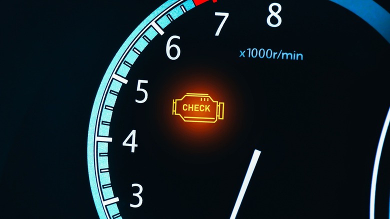 Glowing check engine dashboard light