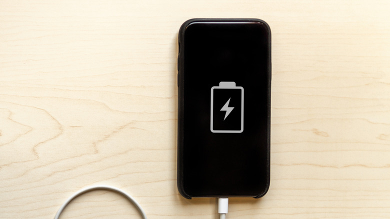 Phone plugged in for charging.