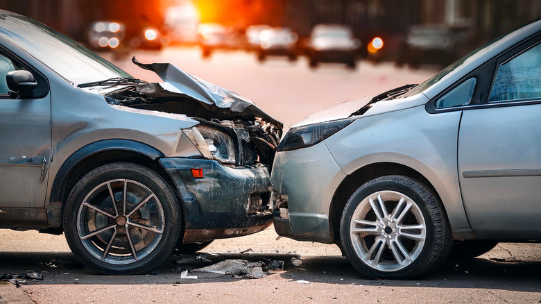 Two cars in a head-on collision