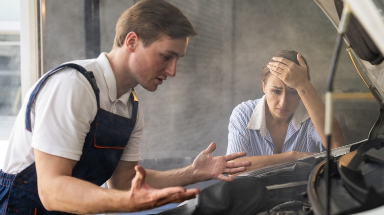 An interaction between a distressed customer and mechanic