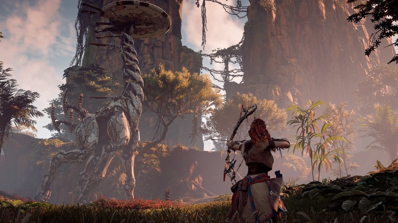 Aloy aiming at a Tallneck in Horizon Zero Dawn