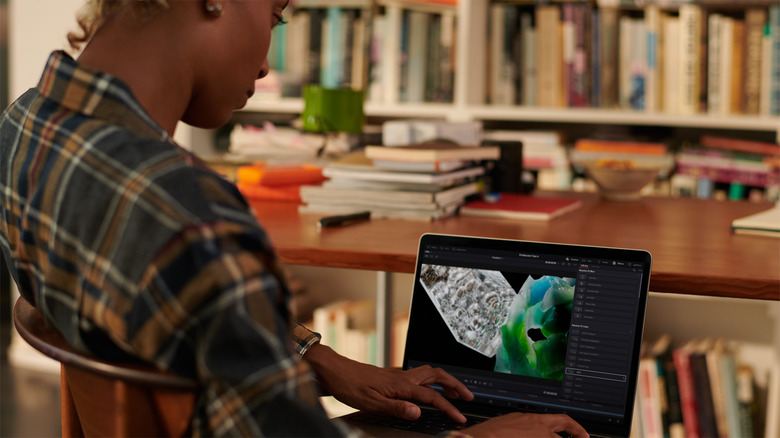 Woman using 2023 MacBook Pro