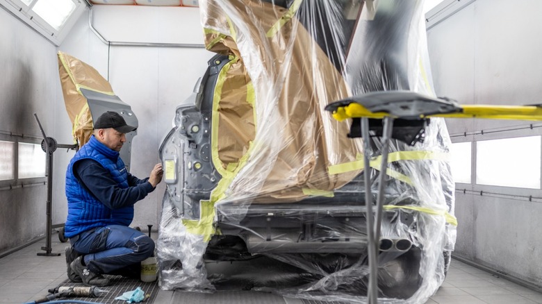 Spray painting a car