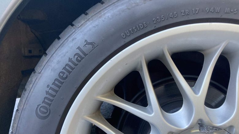 Close-up of Continental DWS-06 tire with text and tire codes visible