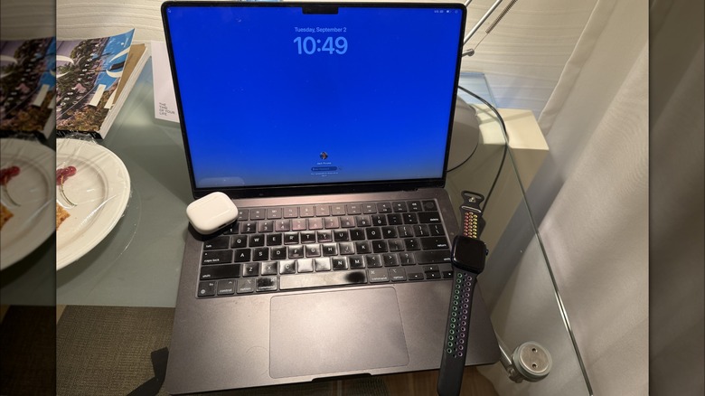 MacBook Pro M3 Pro with AirPods 4 and Apple Watch Series 5