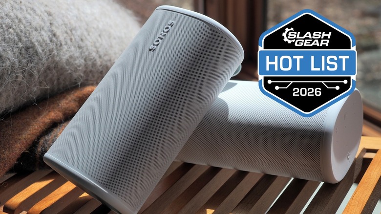 Two white Sonos Play speakers on a bench