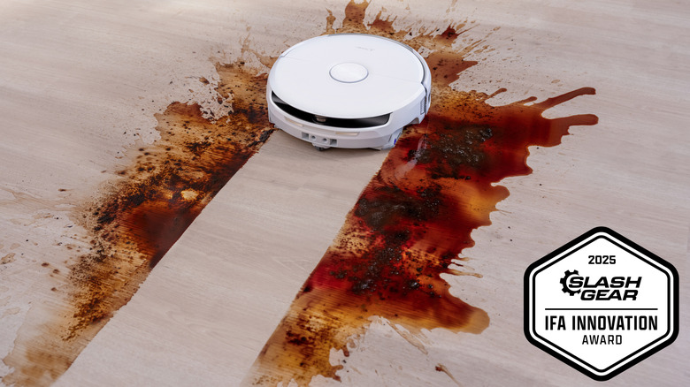 Narwal Flow vacuum cleaning a large stain on floor
