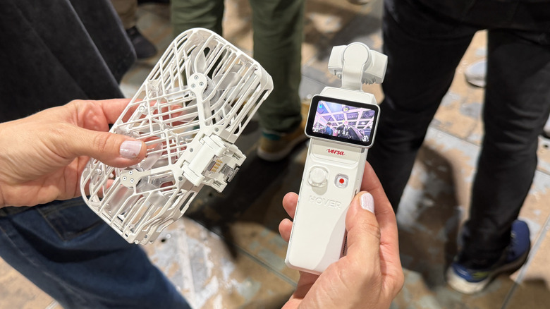 Hands holding the HoverAir Versa