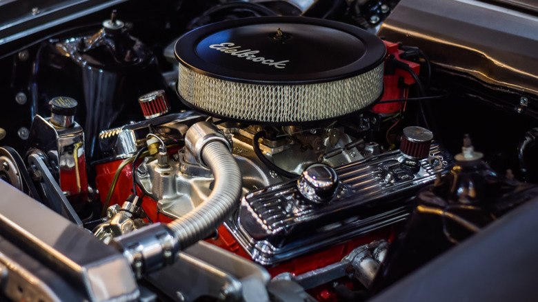 A fully rebuilt 350 small block Chevy engine bay with Edelbrock air-filter