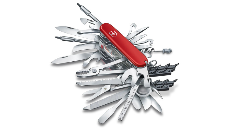 Swiss Champ XXL with all tools unfolded on white background.