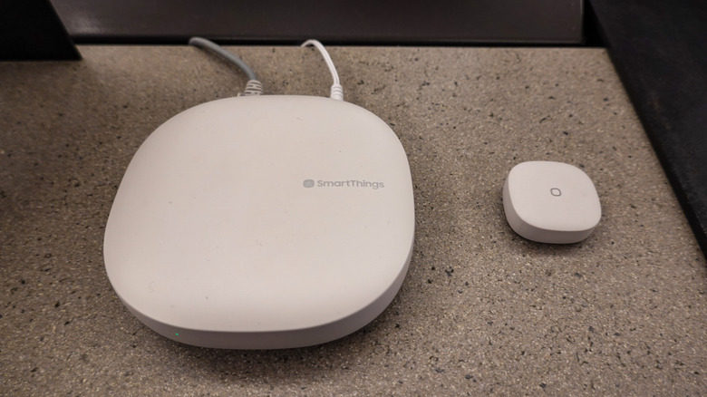 A SmartThings Hub and button on display at an Amazon Bookstore