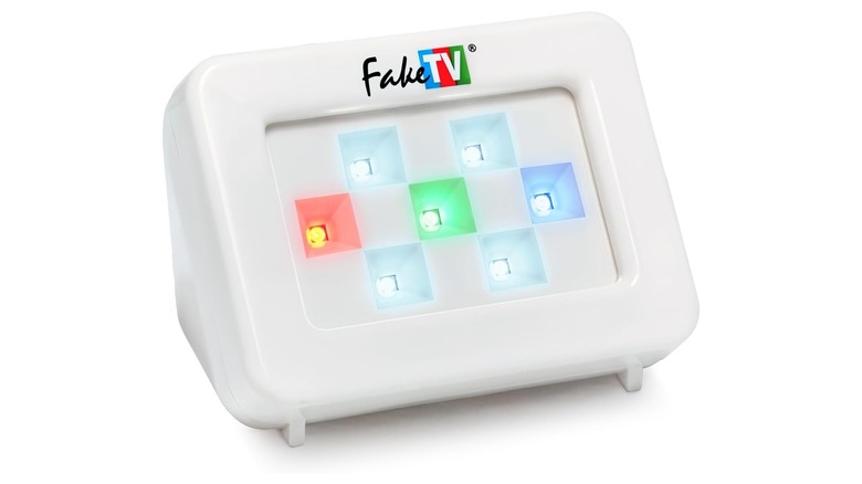 White device with different colored lights on the face
