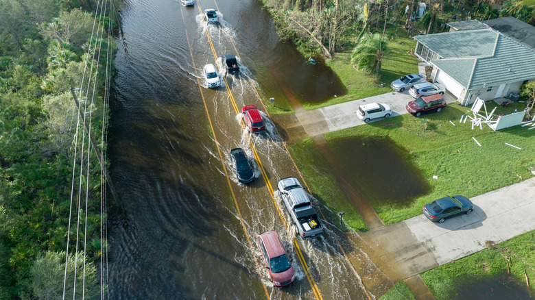 Car driving on a flooded road in Florida