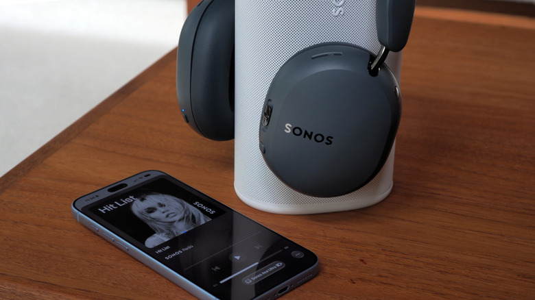 Sonos Ace Ultra, Sonos Play, and Sonos app running on an iPhone