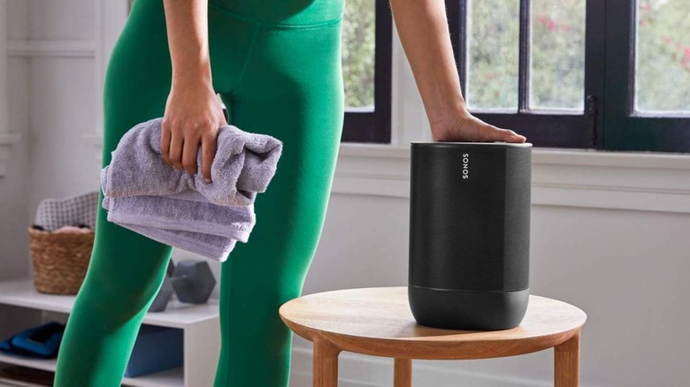 Sonos smart speaker next to person