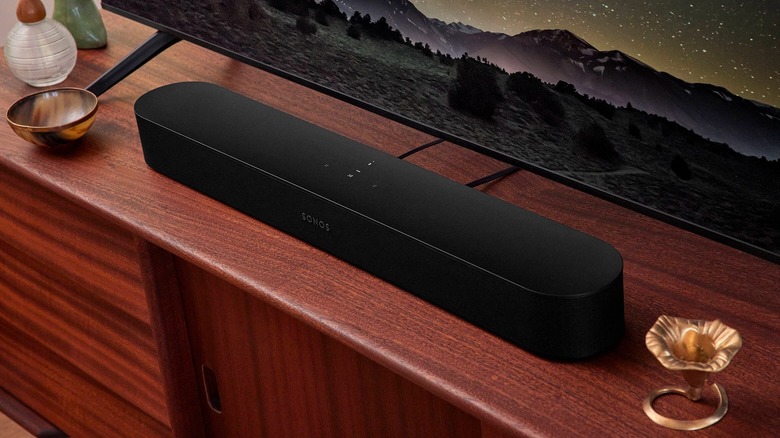 A Sonos soundbar placed beneath a television.