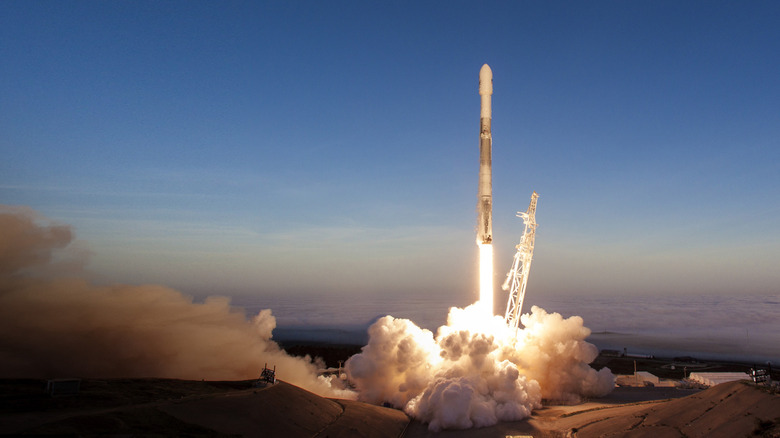 A SpaceX Falcon 9 rocket takes off.