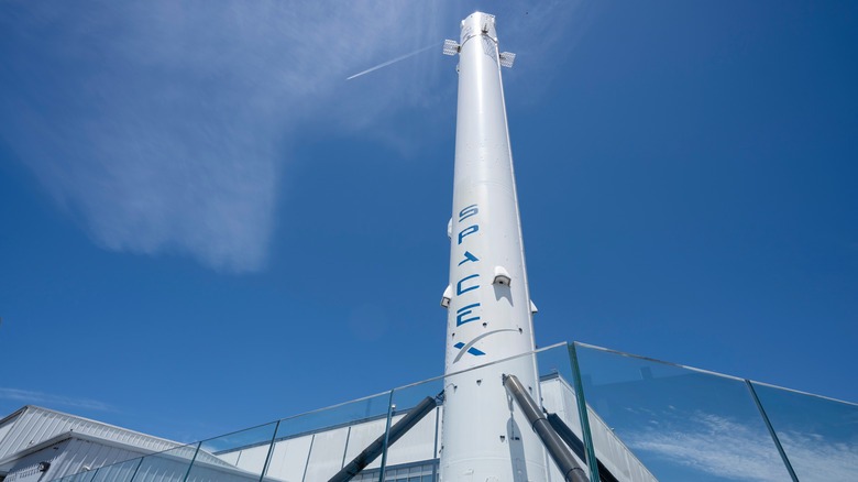 The historic flown and recovered Falcon 9 rocket booster, a permanent vertical display at the SpaceX headquarters in Hawthorne, California.