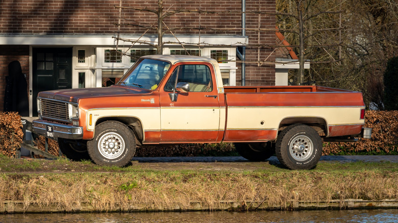Chevy square-body pickup parked