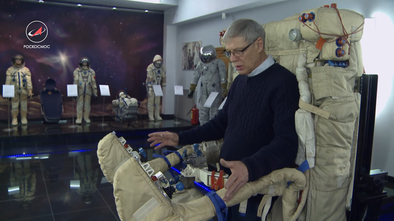 Individual showcasing the space motorcycle