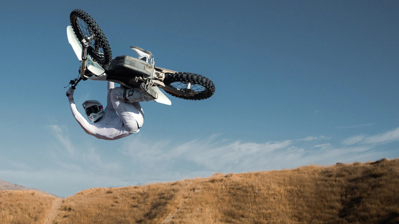 Man doing stunts on a Stark Varg motorcycle