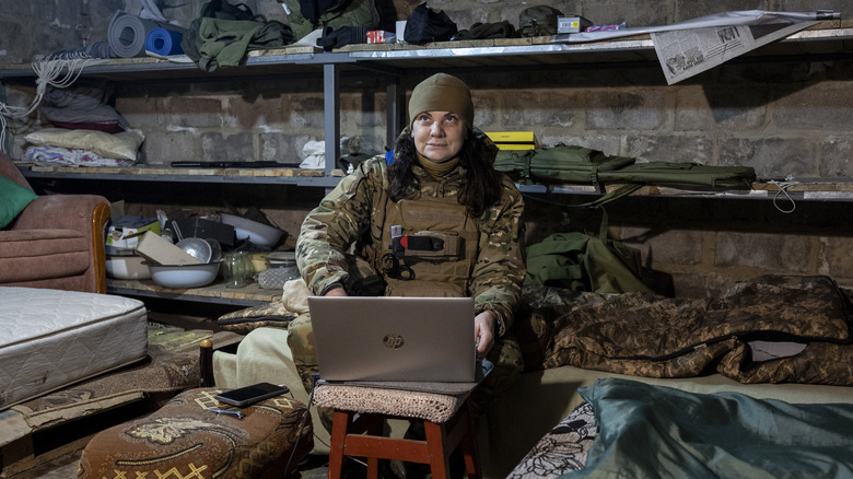 Ukraine soldier using laptop