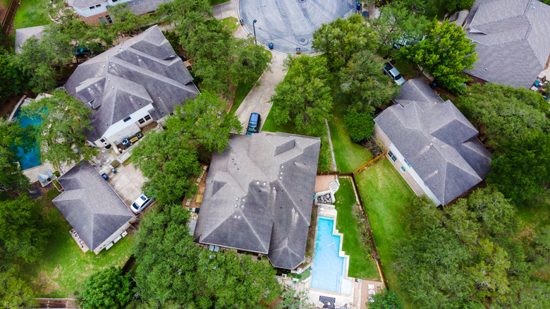 Aerial photo of four residential buildings in a cul-de-sac.