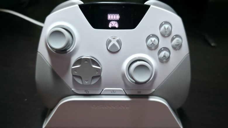 The SteelSeries Aeon Pro Controller inside its dock