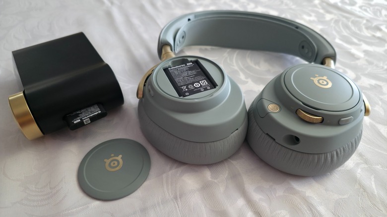 The Artctis Nova Elite headset and GameHub, showing the battery compartments in each