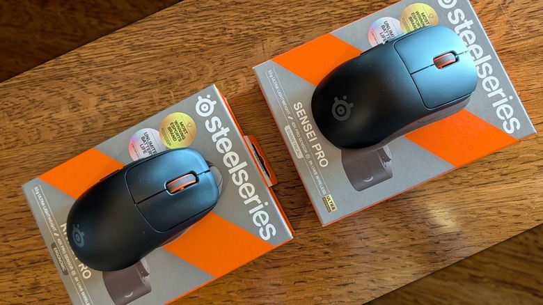 SteelSeries Rival Pro and Sensei Pro mice resting on their product boxes