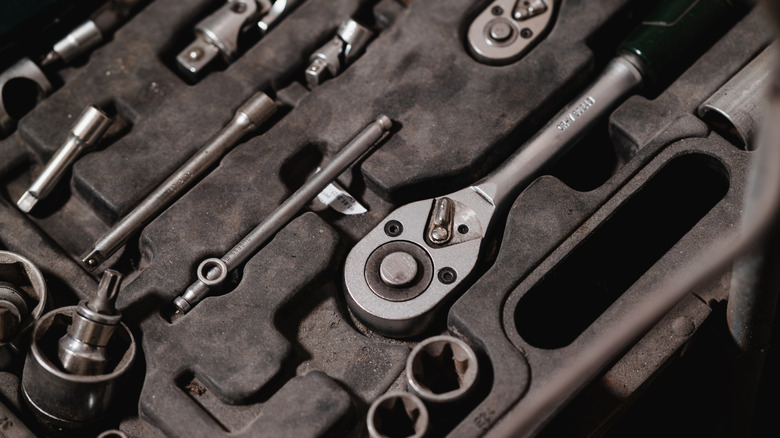 Tools in compartments in a mechanic's toolbox