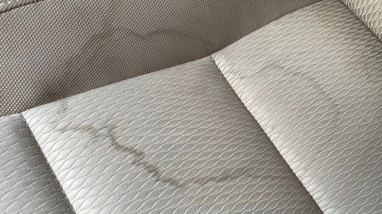 Base of a gray stained car seat