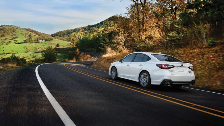 White 2024 Subaru Legacy on the road