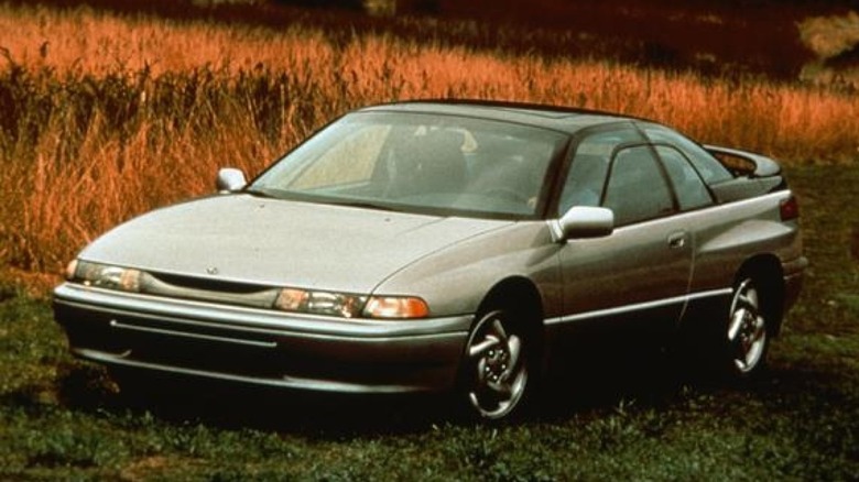 Subaru SVX parked grass