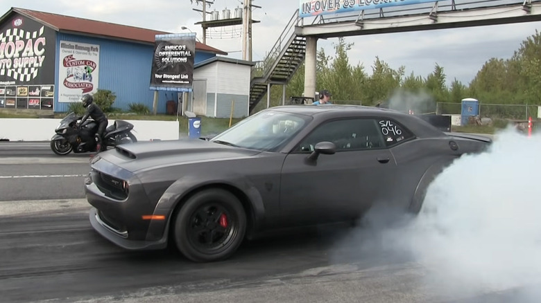 Dodge Challenger Demon vs superbike at drags
