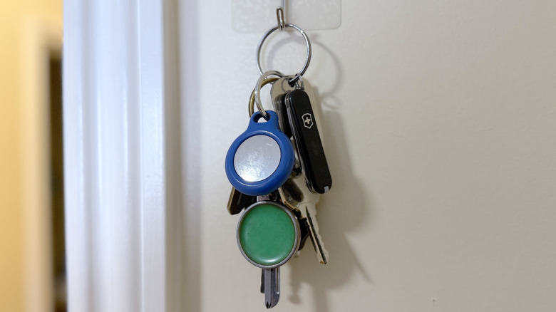 Classic SD attached to set of keys hanging from a hook