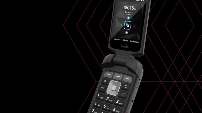 The Sonim XP3plus flip phone against a black and red background