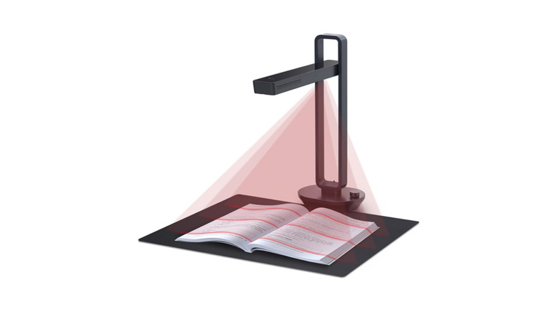 CZUR Aura Pro portable book scanner in action