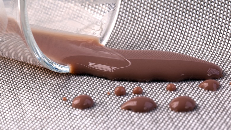 Closeup of hydrophobic fabric with chocolate milk