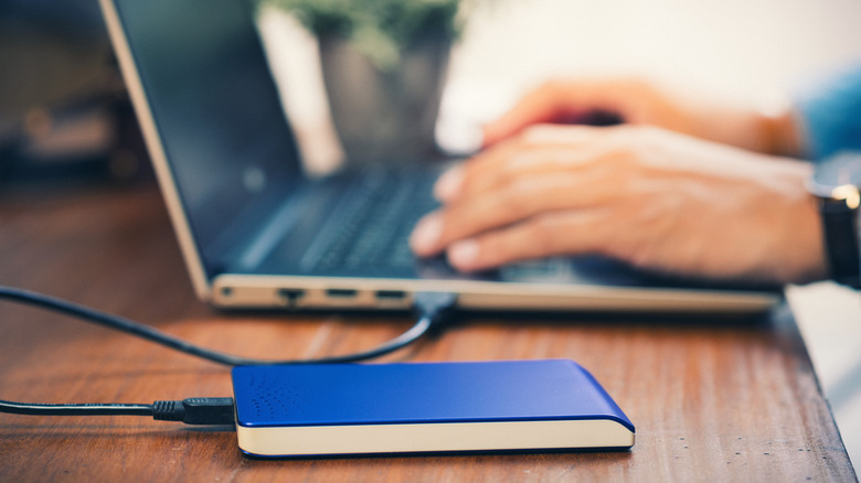 External hard drive with laptop