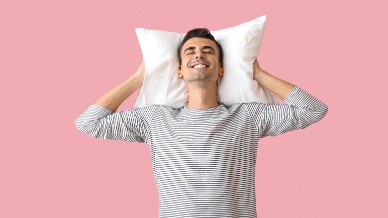 Man resting on pillow 