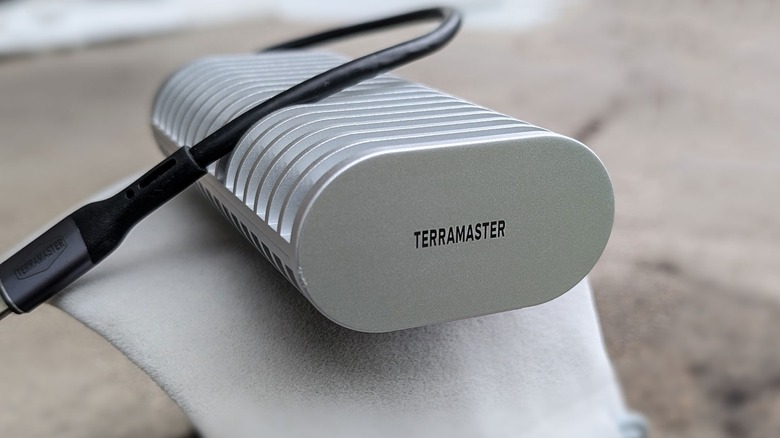 TerraMaster brand SSD enclosure with USB-C cord.