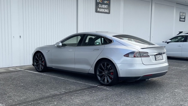 The Tesla Model S P85D in grey parked on the road