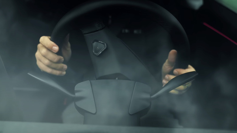 A photo through the windscreen of the S3EXY Stalk by Enhance Auto being used by a driver.