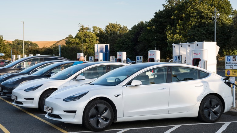 Teslas plugged in charging