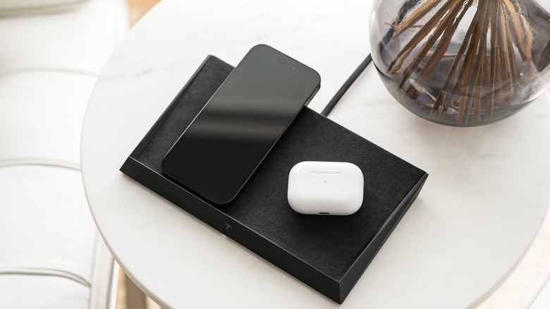 Tesla Wireless Charging Platform on a table.